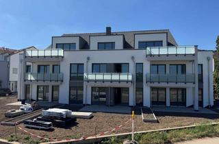 Wohnung kaufen in Erlenweg 22, 65474 Bischofsheim, Modernes Wohnen in grüner Feldrandlage