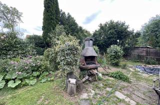 Einfamilienhaus kaufen in 65239 Hochheim, Harmonisches und geräumiges Einfamilienhaus mit großem Garten in idyllischer Lage