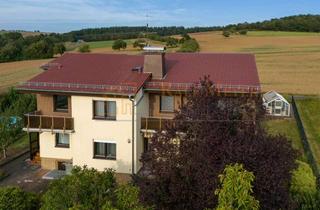 Einfamilienhaus kaufen in 35619 Braunfels, *Einfamilienhaus mit Einliegerwohnung in Feldrandlage von Braunfels-Neukirchen*