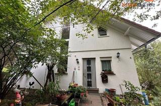 Einfamilienhaus kaufen in 36381 Schlüchtern, Vermietetes Einfamilienhaus mit Garten, Terrasse und traumhaftem Blick ins Grüne in Heiligenborn
