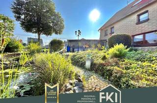 Doppelhaushälfte kaufen in 56472 Dreisbach, **Gepflegte Doppelhaushälfte mit toller Gartenanlage und gräumigen Garagen in Dreisbach**