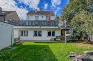 Einfamilienhaus kaufen in 71272 Renningen, Freistehendes Einfamilienhaus mit Einliegerwohnung, möglichem Gewerbe im UG & einzigartiger Terrasse