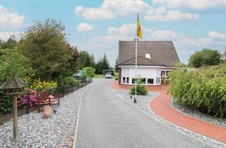 Haus kaufen in Bremerhavener Straße 30A, 21765 Nordleda, Familientraum mit großer Gartenoase, Wintergarten und überdachter Terrasse in idyllischer Lage