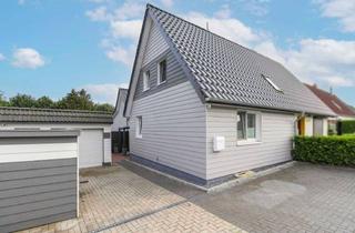 Doppelhaushälfte kaufen in Siedlung Steenrade 21, 23684 Scharbeutz, Moderne, kernsanierte Doppelhaushälfte mit schönem Garten, 2 Terrassen und Garage in Pönitz