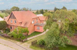 Haus kaufen in Karlsburg, 17335 Strasburg, Greifen Sie zu! Potenzialstarke DHH mit Garten und 2 Garagen in naturnaher Lage