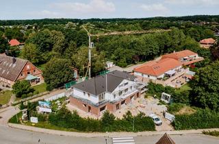 Wohnung kaufen in Dorfstraße 51, 21365 Adendorf, Grün gelegen an der Teichaue --3,5-Zimmer-Terrassenwohnung