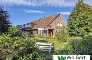 Haus kaufen in 25767 Tensbüttel-Röst, Exklusives Mehrgenerationshaus mit drei Wohneinheiten und 450 m² Wohnfläche auf traumhaftem Grunds