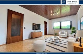Wohnung kaufen in Breitestraße, 61267 Neu-Anspach, Charmante Zweizimmerwohnung mit Einbauküche und Stellplatz in ruhiger Wohnlage mit Blick ins Grüne