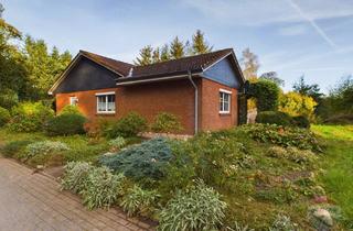 Einfamilienhaus kaufen in Meiereistrasse, 24401 Böel, Lichtdurchfluteter Winkelbungalow mit großzügigem Grundstück