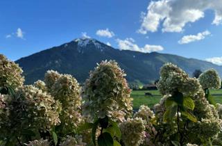 Wohnung kaufen in 83700 Rottach-Egern, Gartenwohnung mit Wohlfühlatmosphäre und sonnigem Süd-/Westgarten am Tegernsee