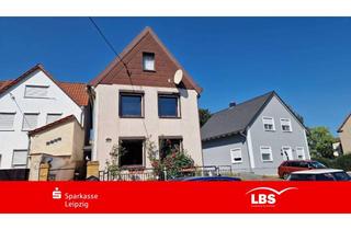 Haus kaufen in 04523 Elstertrebnitz, Sanierungsprojekt mit zwei Garagen