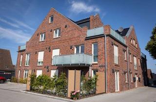 Wohnung kaufen in Hauptstraße 108, 26524 Hage, Stilvolle Eigentumswohnung im EG in Hage! KfW 40 QNG!