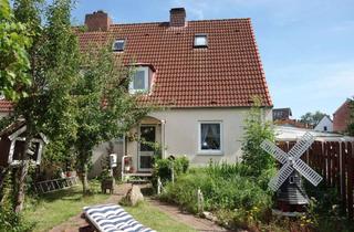 Wohnung kaufen in 24235 Laboe, Charmantes Teilhaus in idyllischer Lage ganz nah am Meer