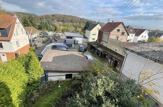 Einfamilienhaus kaufen in 35457 Lollar, PROVISIONFREI! Schönes Einfamilienhaus mit Panaromablick, Parterre-Wohnung und Lagerfläche in Lollar