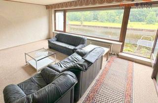 Wohnung kaufen in 97769 Bad Brückenau, Geräumige 3-Zimmer-Wohnung mit Balkon, Parkblick und Tiefgaragenstellplatz in Bad Brückenau