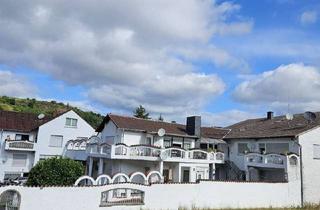 Anlageobjekt in 55585 Niederhausen, Drei Gebäude mit 8 Wohneinheiten & 3 Gewerbeeinheiten, 4 Garagen Vielfältiges Renditepotenzial!