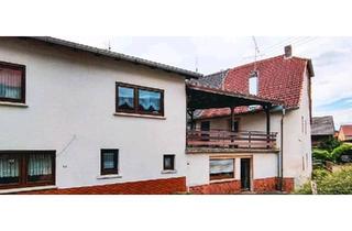 Haus kaufen in 67823 Obermoschel, Obermoschel - Zwei Häuser mit Balkon zwischen den Häusern.
