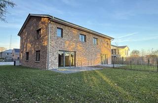 Doppelhaushälfte kaufen in 25436 Uetersen, Neubau-Doppelhaushälfte mit Blick ins Grüne