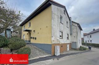 Haus kaufen in 36119 Neuhof, Solide Kapitalanlage: 5 vermietete Wohnungen & Lagerfläche zur individuellen Nutzung