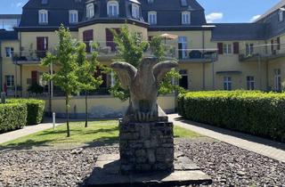 Wohnung kaufen in 51503 Rösrath, Wohnen mit Schlosscharme in bester Lage – Exklusive Dachgeschosswohnung mit traumhafter Terrasse