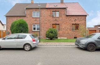 Doppelhaushälfte kaufen in Ziegeleistraße, 06800 Raguhn-Jeßnitz, Familientraum in ruhiger Lage: Gepflegte Doppelhaushälfte mit großzügigem Garten in Raguhn-Jeßnitz