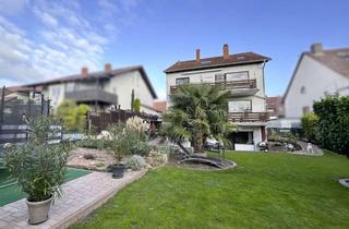 Haus kaufen in 67227 Mörsch, Freistehendes Haus mit zwei Wohnungen, sonnigem Garten, Terrasse und zwei Balkonen