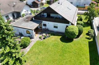 Einfamilienhaus kaufen in 86830 Schwabmünchen, "Zwei unter einem Dach" schafft dieses Einfamilienhaus mit Einliegerwohnung und Garten