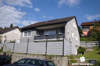 Haus kaufen in 63937 Weilbach, BERK Immobilien – Vielseitiges Ein- bis Zweifamilienhaus für Familien oder Investoren in Weilbach