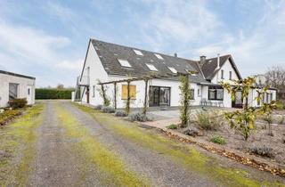 Wohnung kaufen in In Der Veenhey, 47608 Geldern, Exklusives Wohnen in einer charmanten Dachgeschosswohnung mit eigenem Garten in Geldern-Vernum