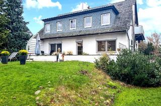 Haus kaufen in Fledermauskamp, 38110 Braunschweig, Braunschweig-Bienrode: Zweifamilienhaus mit ca. 199 m² Wohnfläche auf einem idyllischen Grundstück