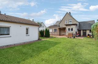 Einfamilienhaus kaufen in Nymphenseeweg 21a, 15834 Rangsdorf, Moderner Bungalow plus sanierungsbedürftiges Einfamilienhaus auf großem Grundstück in Rangsdorf