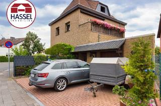 Einfamilienhaus kaufen in Bonner Str. 26, 53919 Weilerswist, Ein Ort für alle Generationen – Zuhause mit Bungalow und Klinkercharme!