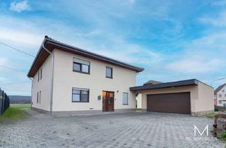 Einfamilienhaus kaufen in 66882 Hütschenhausen, MG - Vermietetes Einfamilienhaus mit Garten und Garage in Spesbach