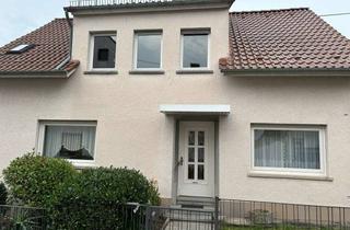 Einfamilienhaus kaufen in 55595 Hüffelsheim, TOP-GELEGENHEIT! Einfamilienhaus mit großzügigem Gartengrundstück in Hüffelsheim zu verkaufen
