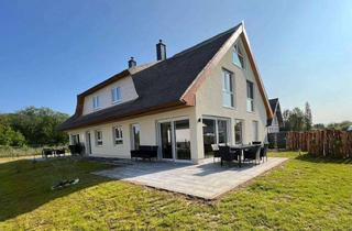 Haus kaufen in Am Kliff 32, 18551 Glowe, Wunderschöne exlusive Doppelferienhaushälfte in bester Lage von Glowe in unmittelbarer Ostseenähe