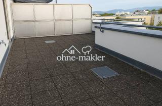 Penthouse kaufen in 76437 Rastatt, Exklusive 3-Zimmer-Penthousewohnung mit 36 m² Dachterrasse und zwei Stellplätzen