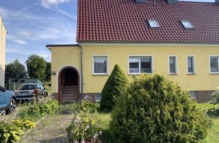 Doppelhaushälfte kaufen in Werchau 10a, 04936 Schlieben, Doppelhaushälfte mit zwei Garagen in ruhiger Dorfgemeinschaft