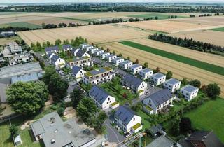 Wohnung kaufen in 52353 Düren, Wohnkomfort im Grünen: 3-Zimmer-Wohnug mit Garten und Terrasse