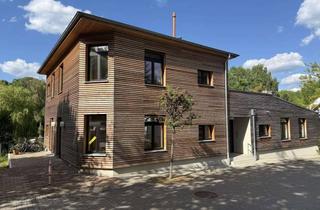 Wohnung kaufen in 16775 Stechlin, Haus im Haus: Luxus auf drei Ebenen mit großer Terrasse