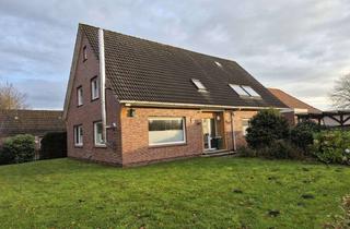 Haus kaufen in 26532 Großheide, Zweifamilienhaus mit Werkstatt
