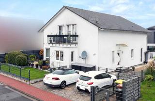 Haus kaufen in Langenselbolderweg 48, 63526 Erlensee, Energieeffizientes Wohnen auf hohem Niveau: Großzügiges Zweifamilienhaus in Erlensee
