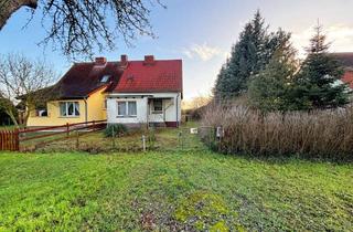 Doppelhaushälfte kaufen in 39615 Behrendorf, Sanierungsbedürftige Doppelhaushälfte mit großem Grundstück