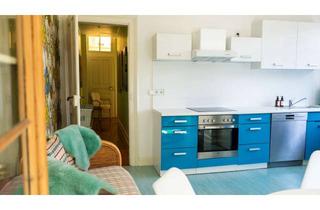 Wohnung kaufen in 76530 Innenstadt, Charmante Dachgeschosswohnung mit Loggia und Garten in ruhiger Lage