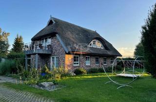 Mehrfamilienhaus kaufen in Neuensien, 18586 Sellin, Ferienhaus in Neuensien mit 4 Wohnungen: Komfortable Ausstattung und Seeblick