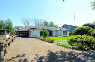 Haus kaufen in Am Pool, 25795 Weddingstedt, Großzügiger Winkelbungalow in ruhiger Wohnlage mit Ausbaureserve und gepflegtem Garten