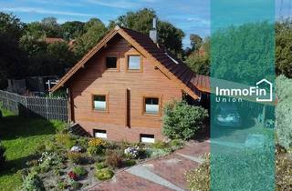 Haus kaufen in Wollgrasweg 16, 26316 Varel, Einzigartiges Holzhaus in Obenstrohe –Zentrales Wohnen mit natürlichem Charme, jetzt zum neuen Preis