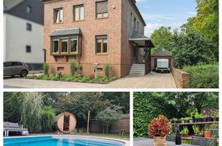 Haus kaufen in Otto-Suhr-Straße 25, 52355 Düren, Düren Lendersdorf - Freistehendes Stadthaus mit Pool, Sauna und modernem Komfort
