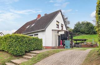 Doppelhaushälfte kaufen in Am Großen Geeren 30, 27721 Ritterhude, Vermietete Doppelhaushälfte mit Doppelcarport und Garage in Ritterhude
