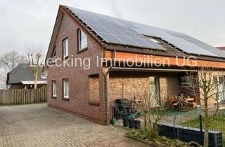 Immobilie kaufen in 26683 Saterland, Wohngebäude mit 2 Wohneinheiten und PV-Anlage