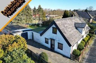 Haus kaufen in 25774 Lehe, Verkauf einer ehemaligen Reetdachkate mit Garage in Lehe bei Lunden, Kreis Dithmarschen